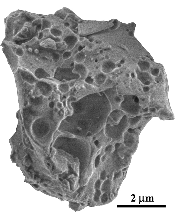 This microscope image shows a grain of agglutinate glass similar to those analyzed in the lunar surface-water study reported in Nature Geoscience. The specimen in this image, which comes from samples returned by Apollo astronauts, is smaller than a typical dust grain. Image by Yang Liu.