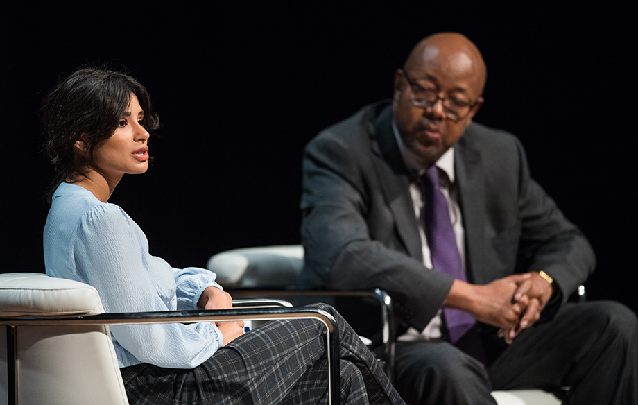 Photo of Diane Guerrero speaking with Leonard Pitts Jr.