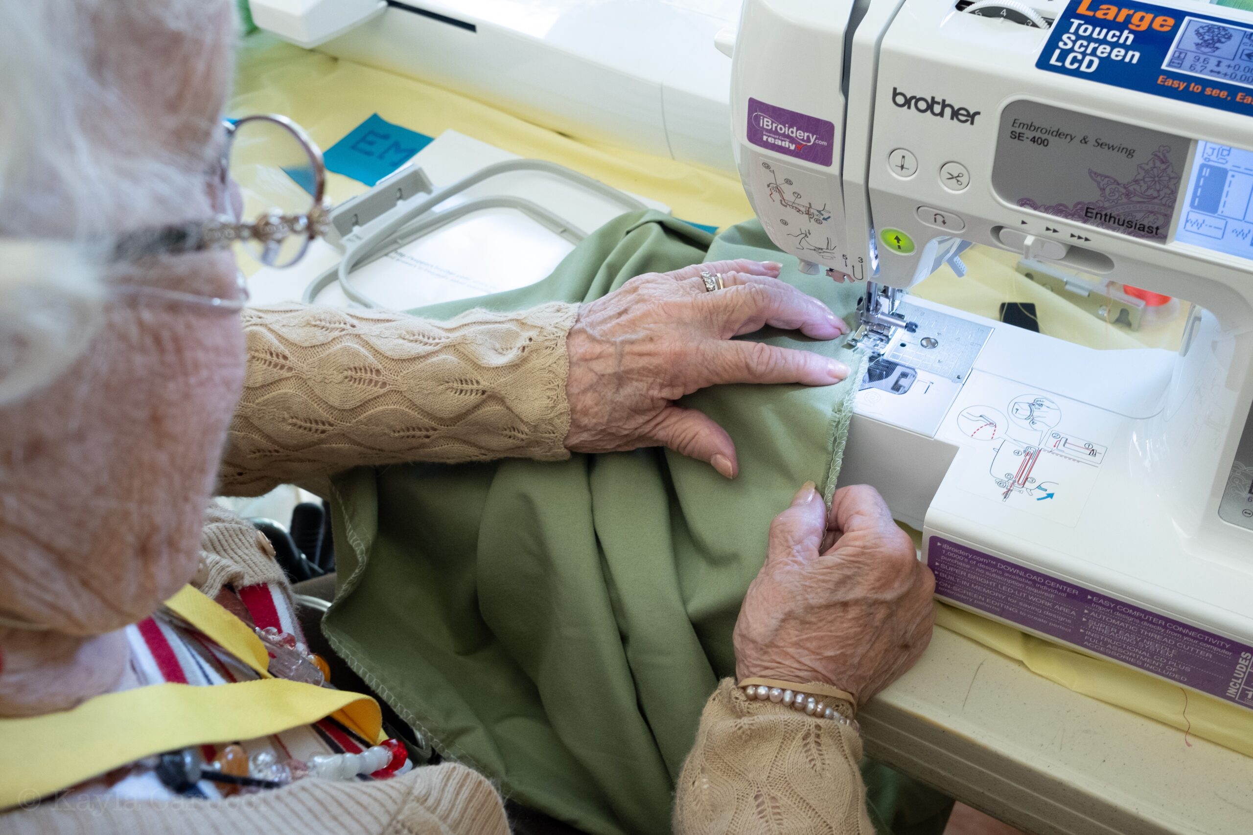 Gigi, age 92, fixing pillowcase