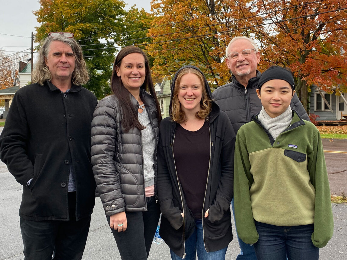 Graham Hamilton, PCAP arts programming coordinator, first on the left, led a team of 40 U-M volunteers to 26 Michigan state prisons.