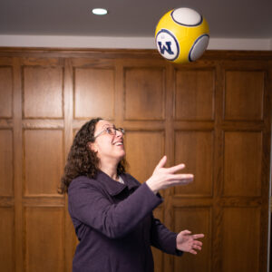 Helene Fligiel tossing a ball in the air