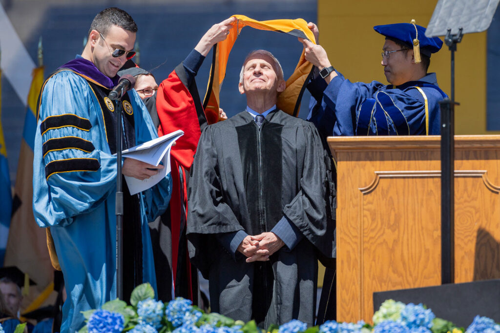 Photo of Anthony Fauci receiving the hood for his honorary Doctor of Science degree.