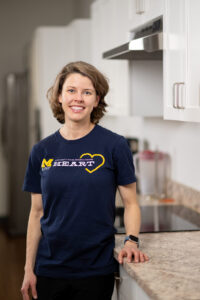 Elizabeth "Libby" Yost, who earned her doctorate in occupational therapy in 2018, helped Craig Hawkins regain some independence at the HEART Clinic. Image credit: Eric Bronson, Michigan Photography
