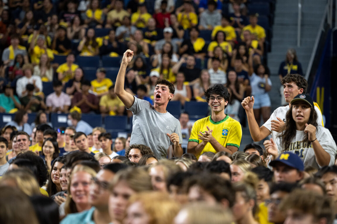Photo of students cheering.
