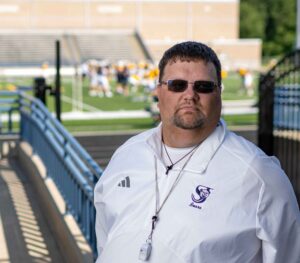 Andrew Pratley, assistant principal and head football coach at St. Joseph High School, says concussion awareness and training has made games safer. Image credit: Eric Bronson, Michigan Photography