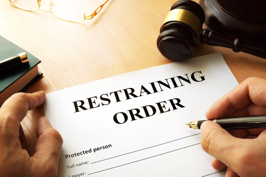 Document with the name restraining order. Image credit: iStock