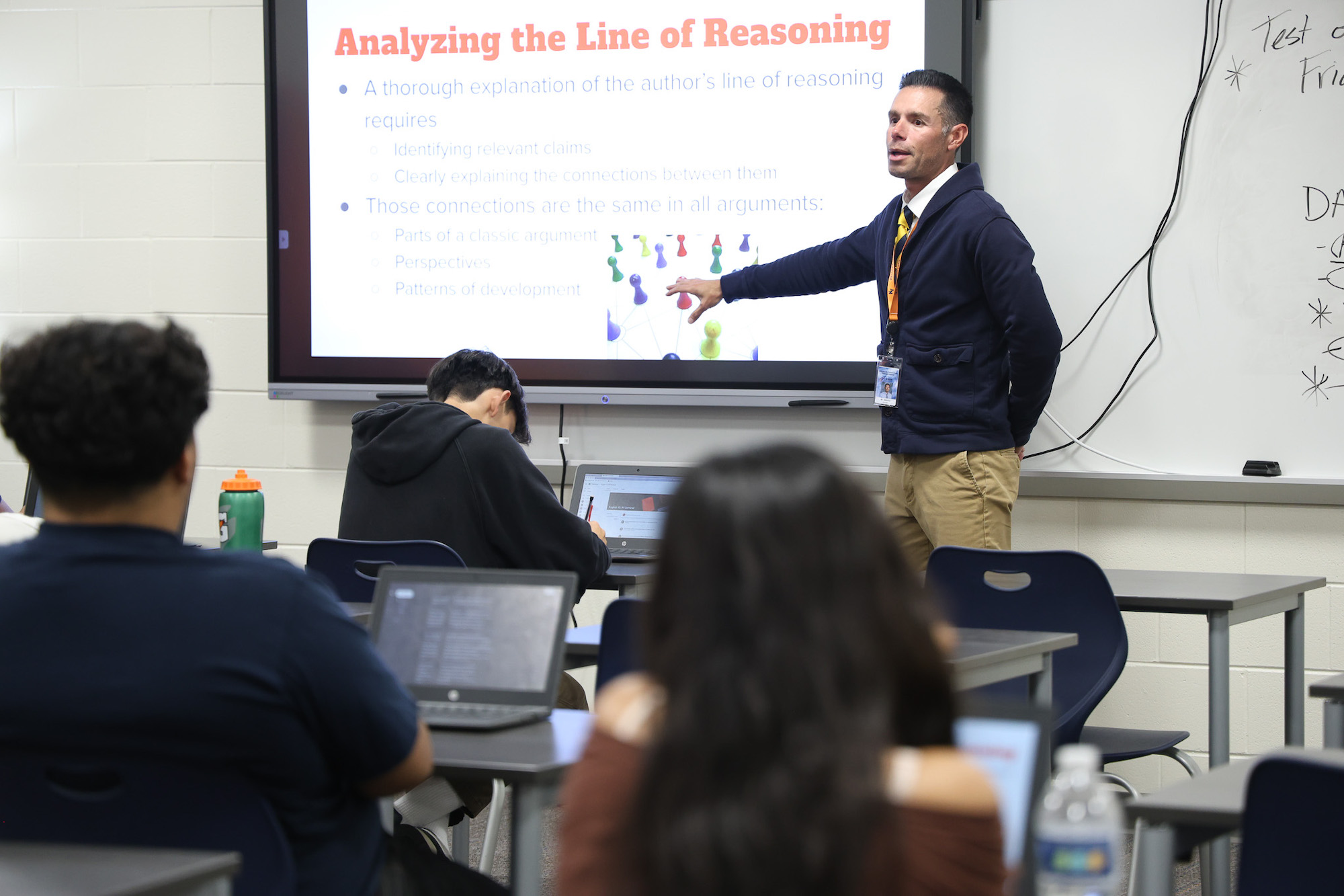 David Jimenez switched careers from owning a health club to teaching an advanced placement seminar class to 10th graders at Kelloggsville High School in Wyoming after earning his certification through M-ARC. Image credit: Jeremy Marble