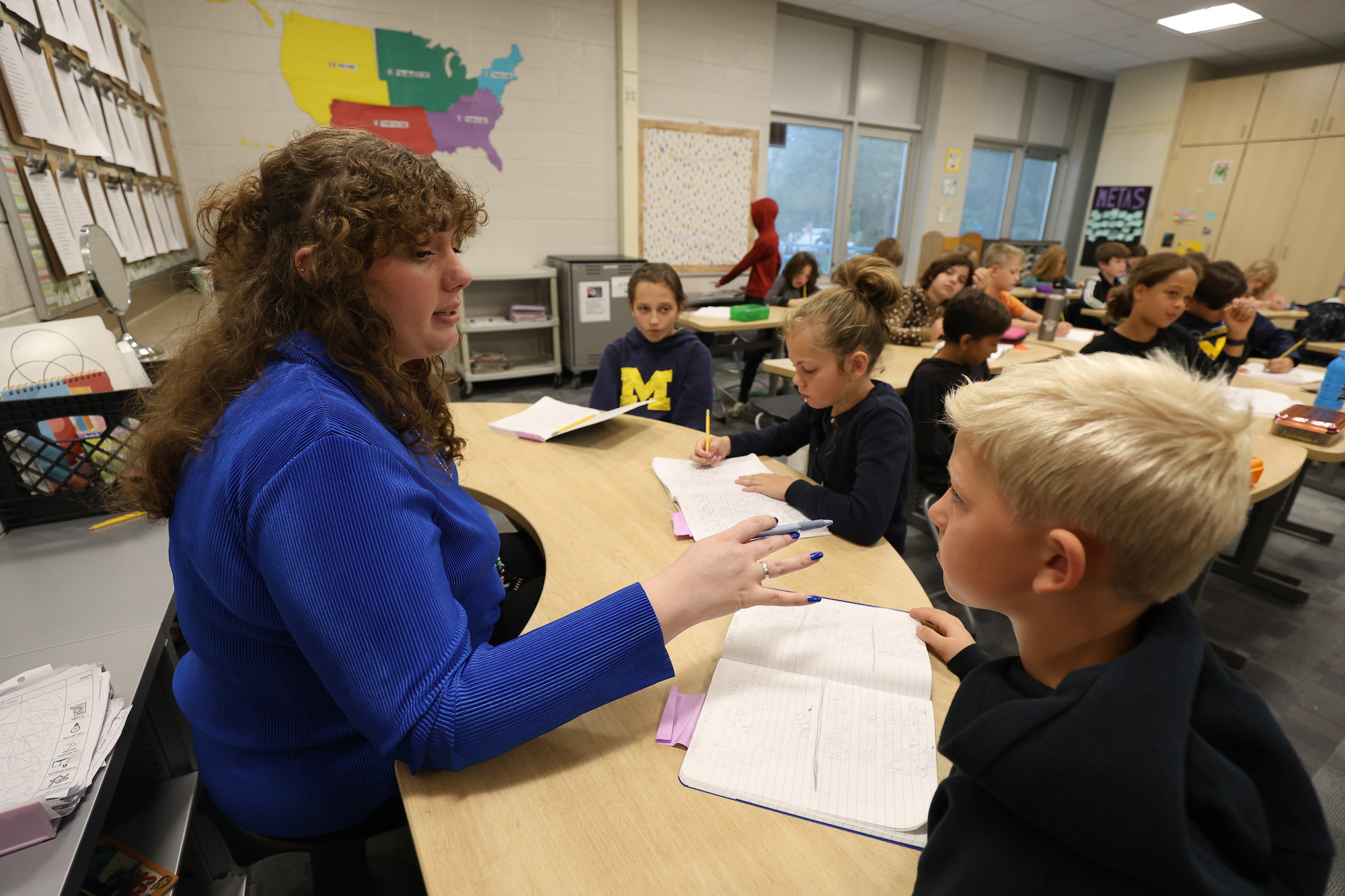 Lizzie Lockwood teaching in her fourth-grade class at Ada Vista Elementary School near Grand Rapids. She gained her teacher certification through the Michigan Alternate Route to Certification at the University of Michigan. Image credit: Jeremy Marble