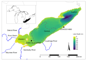 A map of Lake Erie and its neighboring rivers: the Detroit, Maumee, Sandusky and Cuyahoga. A color map of the lake shows its depth, which increases moving west to east. A dashed region occupying most of the central lake shows where conditions are hypoxic.