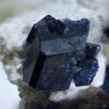Henmilite is named for a father and daughter mineralogist pair working in Japan. Daughter Chiyoko Hemni is one of very few people to have more than one unrelated mineral named after them: chiyokoite is also named for her and occurs alongside henmilite, according to recent University of Michigan doctoral graduate Chris Emproto. This specimen is from the Fuka mine in Japan.