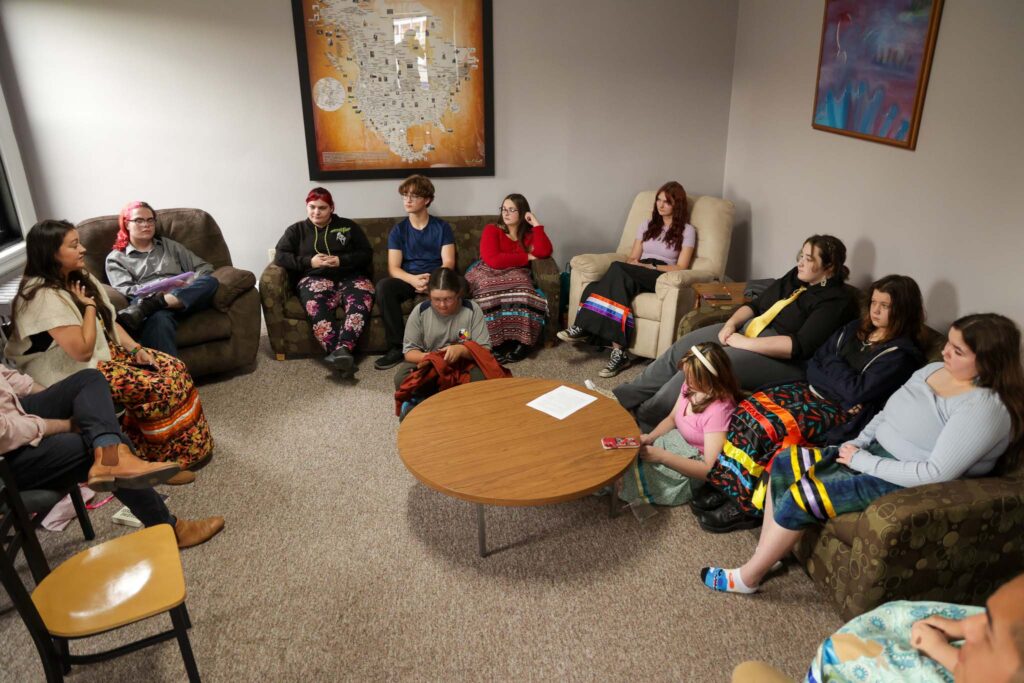 The Indigenous Education Youth Collective group from left to right: Chloe Kannan, LSSU, Alk Sabatine, Hannah Bailey, Elijah Brocklehurst, George Solomon (sitting), Rowan Carter, Ella Black, Jay Johnson, Kamryn Corbiere (sitting), Poppy Solomon, and Piper Bernier.