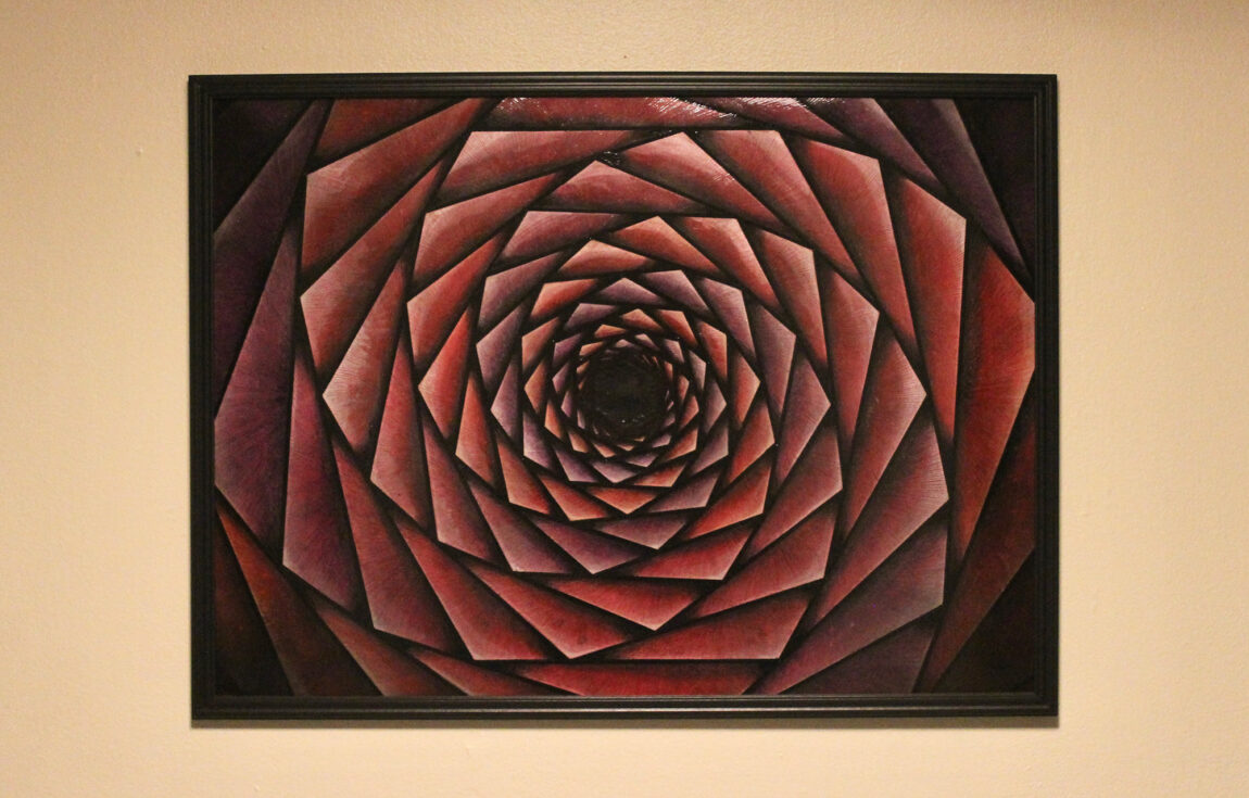 A photo of a red geometric work of art