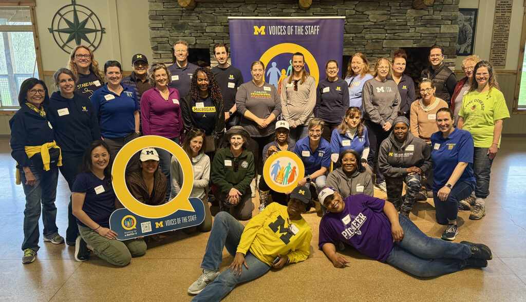 Former U-M staff in a group photo.