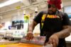 Artist, J.U.L.Y., at the Linkage Community's 2023 Annual Art Workshop, Image credit: U-M Office of University Development.