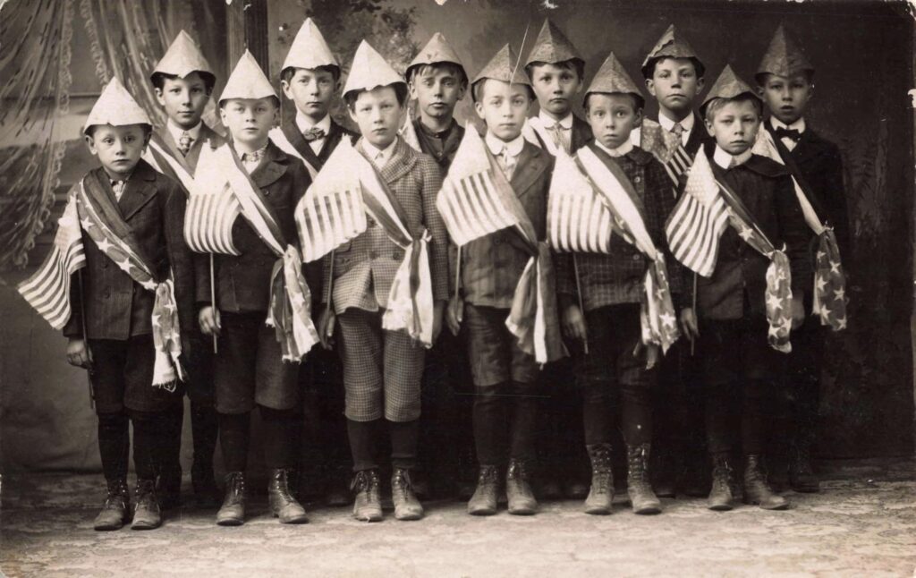 Boys of 2nd and 3rd Grades in Flag Drill, 1906 - '07. Image credit: David V. Tinder Collection of Michigan Photography, University of Michigan William L. Clements Library.