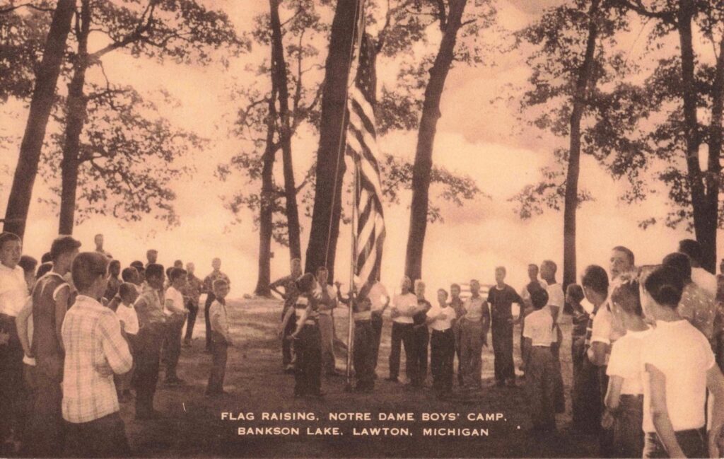 Flag Raising at Notre Dame Boys' Camp, Bankson Lake, Lawton, Michigan. Image credit: University of Michigan William L. Clements Library.