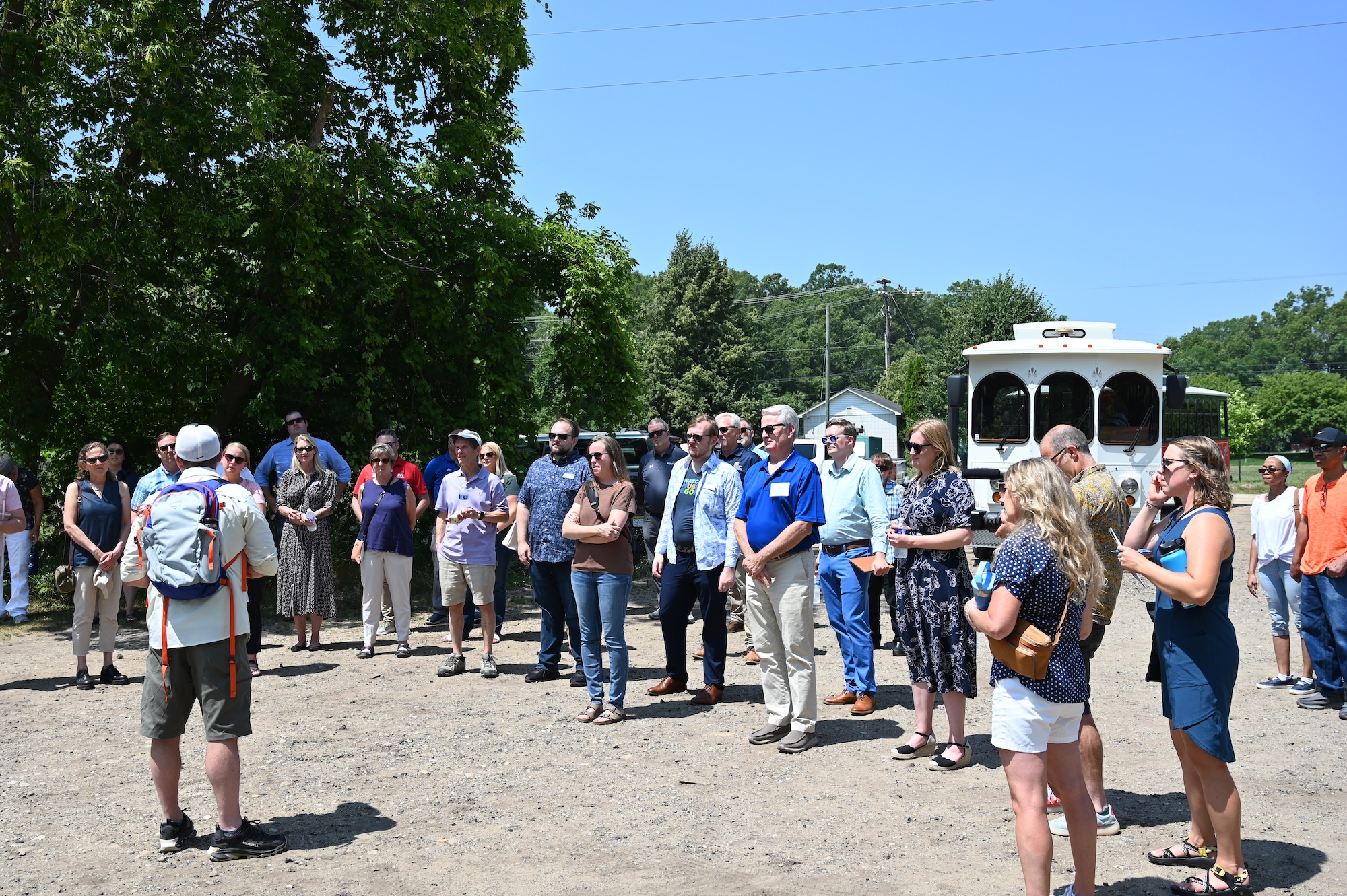 The group touring the restored areas at Muskegon Lake represented the community members, business partners, government workers and other stakeholders who made this possible. Image credit: Greta Guest, Michigan News
