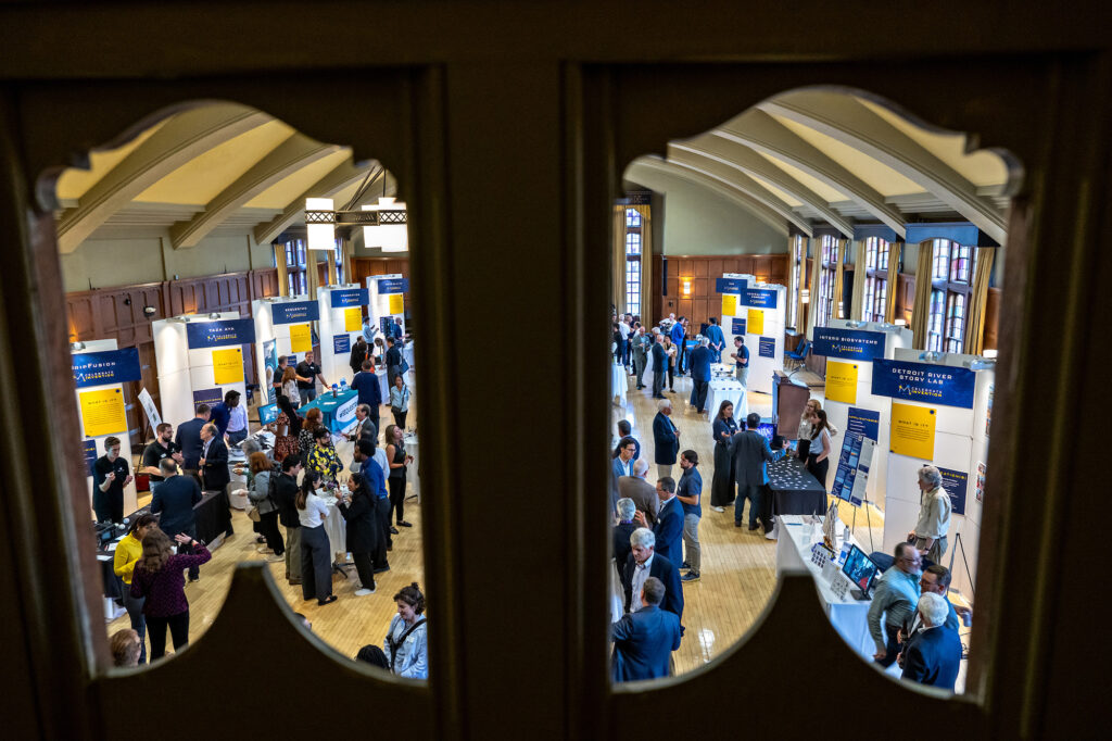 The Michigan League Ballroom is filled with new innovators and their inventions as the community explores the new inventions.