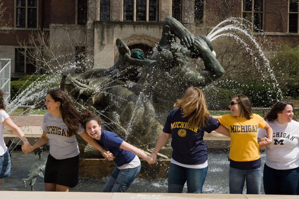 Graduating seniors take the traditional fountain walk through Ingalls Mall in 2008.