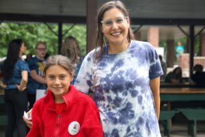 Estee Emery with her mother Shannon Emery at pick-up after camp. Image credit: Jeremy Marble, University of Michigan News