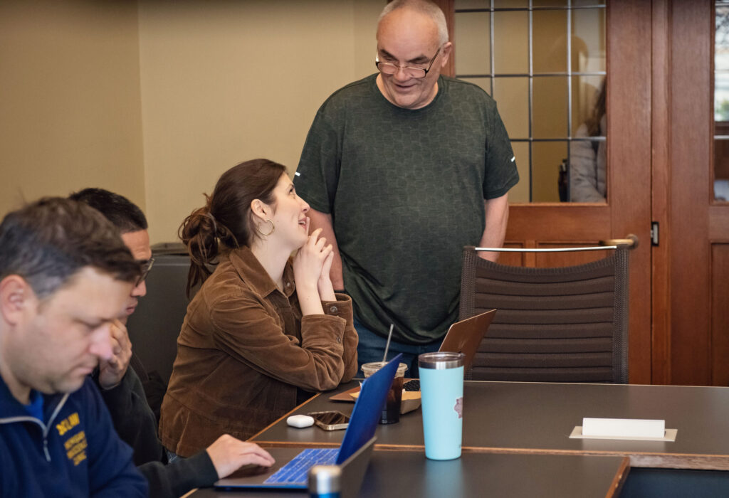 man talking to a student