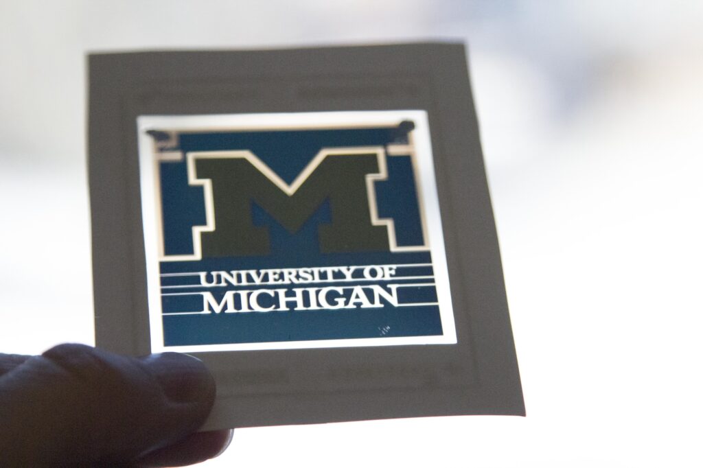 A yellow block M on a blue background, with the "University of Michigan" text in white.