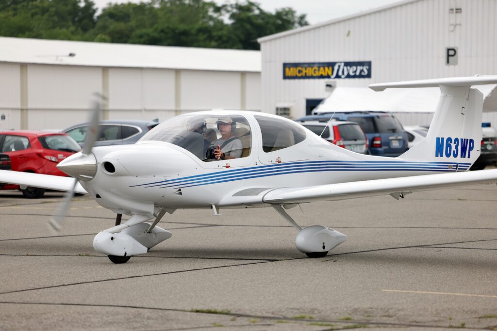 With the sensor in place, Nilton Renno and Rohan Madathil hop in the plane and head toward the runway. Image credit: Brenda Ahearn, Michigan Engineering.