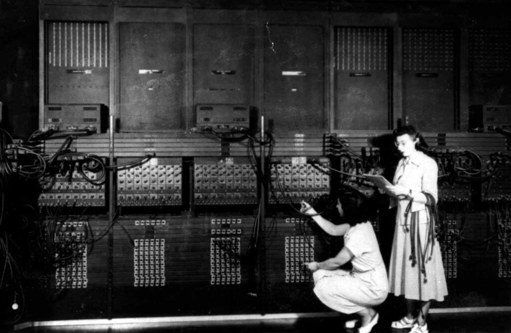 A group of six female mathematicians programmed the ENIAC computer in 1944. Two are shown here.