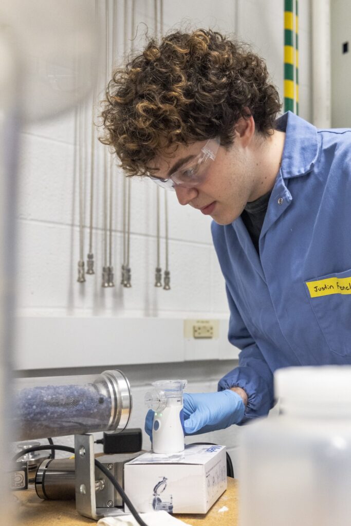 Justin French, undergraduate environmental engineering student, sets up a nebulizer in professor of civil and environmental engineering Herek Clack’s lab at the G.G. Brown Laboratory on North Campus at the University of Michigan. Emily Hong, PhD precandidate in civil and environmental engineering, sets up the plasma machine in professor of civil and environmental engineering Herek Clack’s lab at the G.G. Brown Laboratory on North Campus at the University of Michigan in Ann Arbor, MI on February 18, 2026. Image credit: Gabi Iriarte/Michigan Engineering, Communications & Marketing