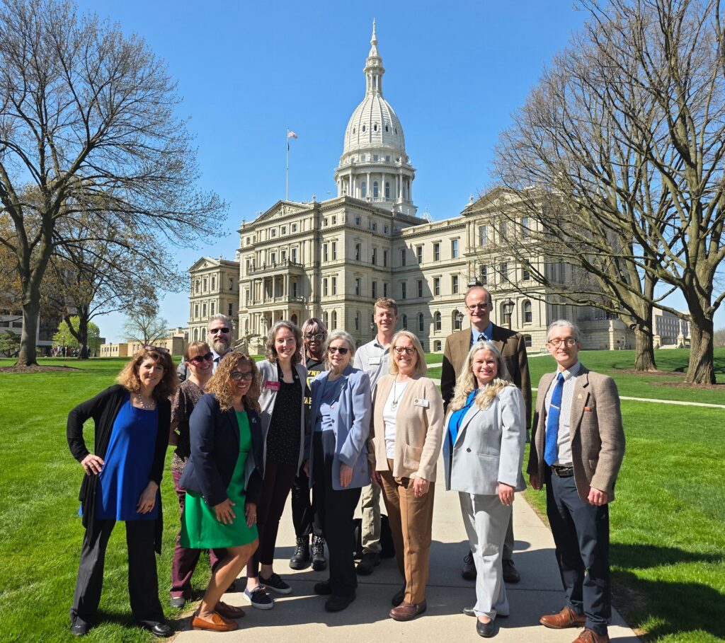 Leader of faculty governance at Michigan public universities gathered outside the State Capitol in Lansing.