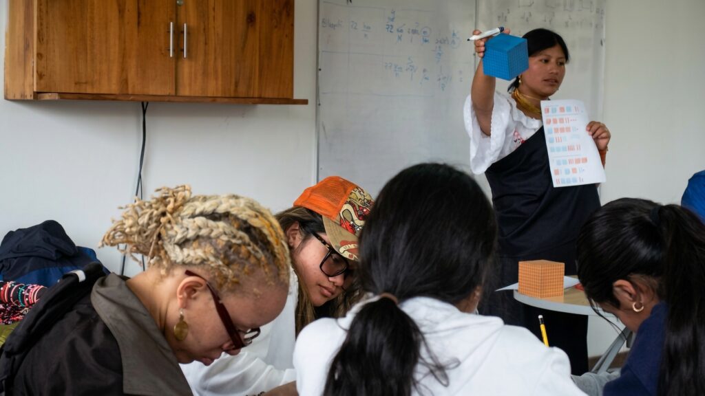 U-M students attend a math class in a rural high school in Otavalo.