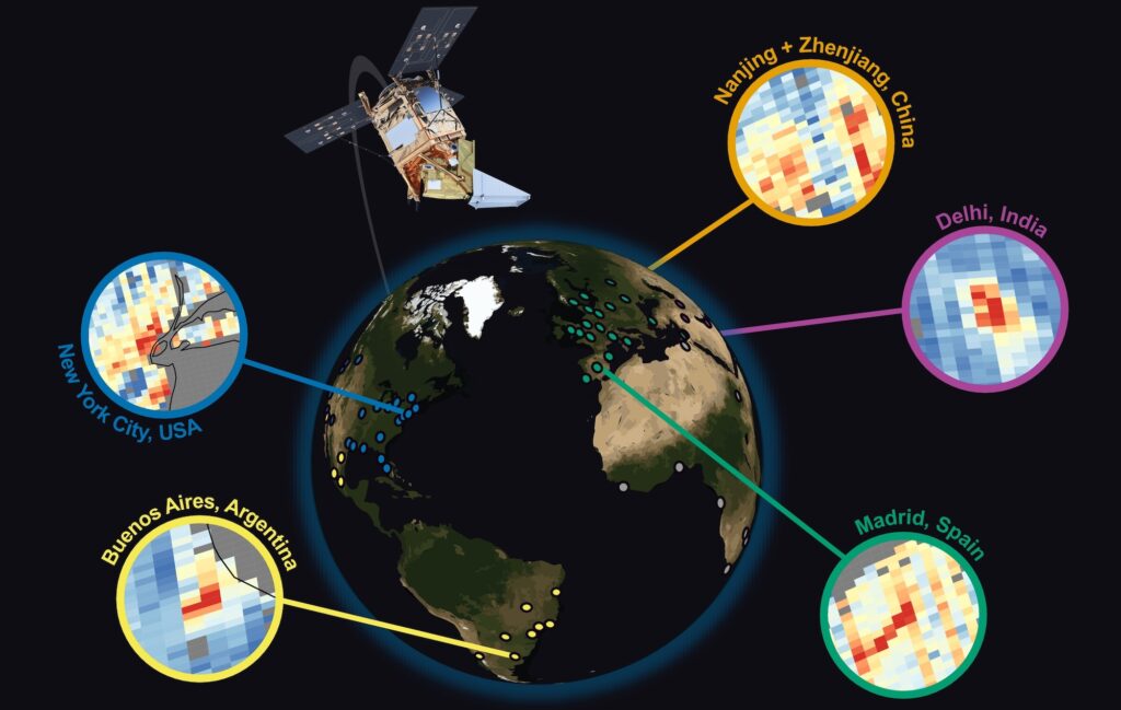 A golden-copper satellite with three solar panels orbits the Earth. Many cities that were surveyed in the study are marked on the map. Five example satellite images are located over New York City, USA; Buenos Aires, Argentina; Nanjing, China; Delhi, India; and Madrid, Spain. The photos show red and orange pixels clustered within blue pixels.