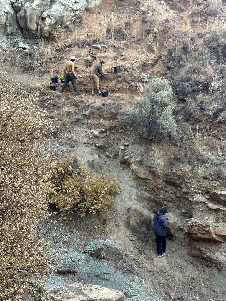 Local archaeologist Molopi Matela and Kyra Pazan of California State University, Stanislaus, work at the Likonong Rock Shelter in the mountains of Lesotho. Here, an international team of archaeologists from the United States, Canada, the United Kingdom, and Lesotho have identified the earliest sustained human occupation in Highland Southern Africa. Image credit: Kyra Pazan, California State University, Stanislaus