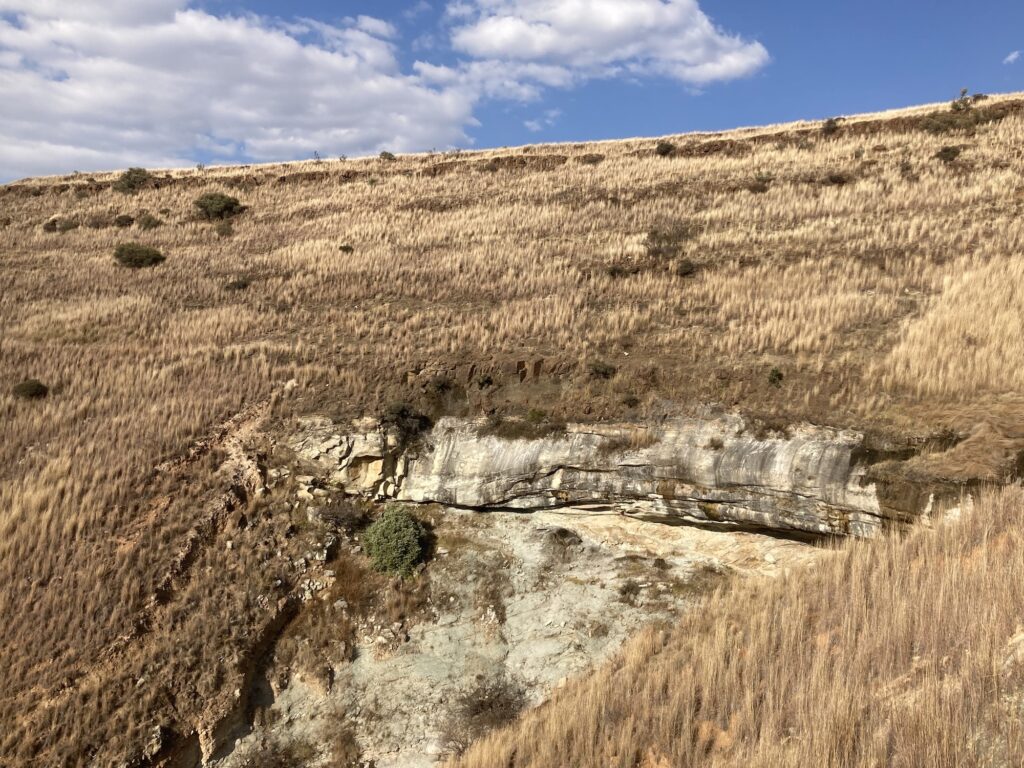 The Likonong Rock Shelter in the highlands of Lesotho was occupied by humans as early as 242,000 years ago. Image credit: Kyra Pazan, California State University, Stanislaus