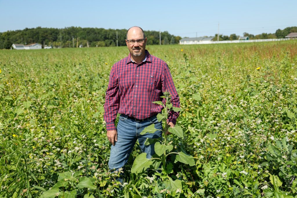 David Halsey in his cover crop field in Adrian, Mich. Image credit: Jeremy Marble, University of Michigan News